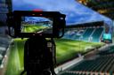 A composite image showing a camera filming Easter Road