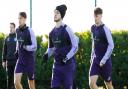 Luke Amos takes part in Hibs training at HTC