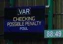 Indication of a VAR review during a Hibs game at Easter Road
