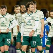 Disappointment is etched on the faces of the Hibs players at full time in Perth
