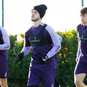 Luke Amos takes part in Hibs training at HTC