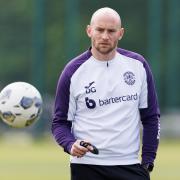 David Gray looks on during training at HTC on Friday